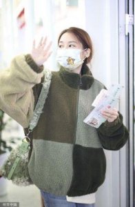 ​陆虎与女友陈曌旭甜蜜现身长沙黄花机场，互显爱意撒狗粮